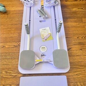 Foldable Purple and Gray Pilates Reformer